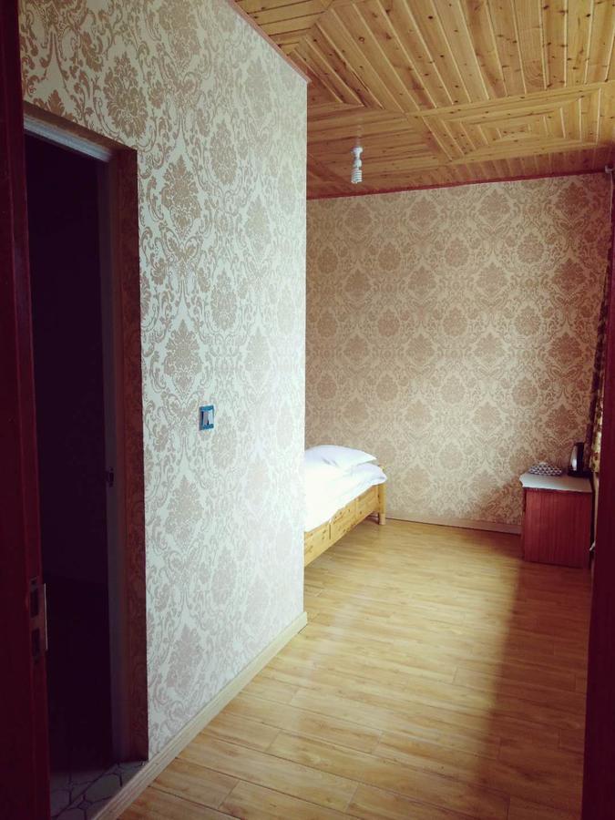 Zishuo Zihua Guest House Daocheng Eksteriør billede