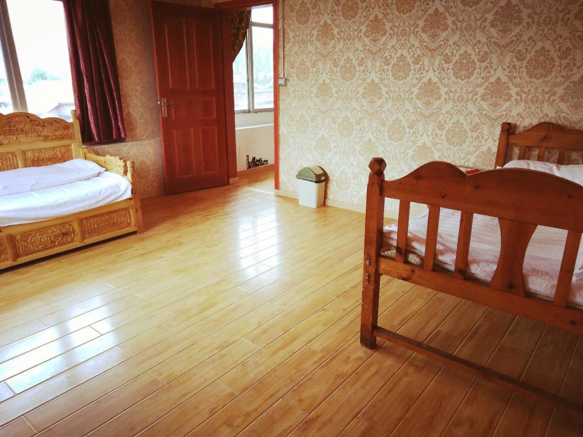 Zishuo Zihua Guest House Daocheng Eksteriør billede