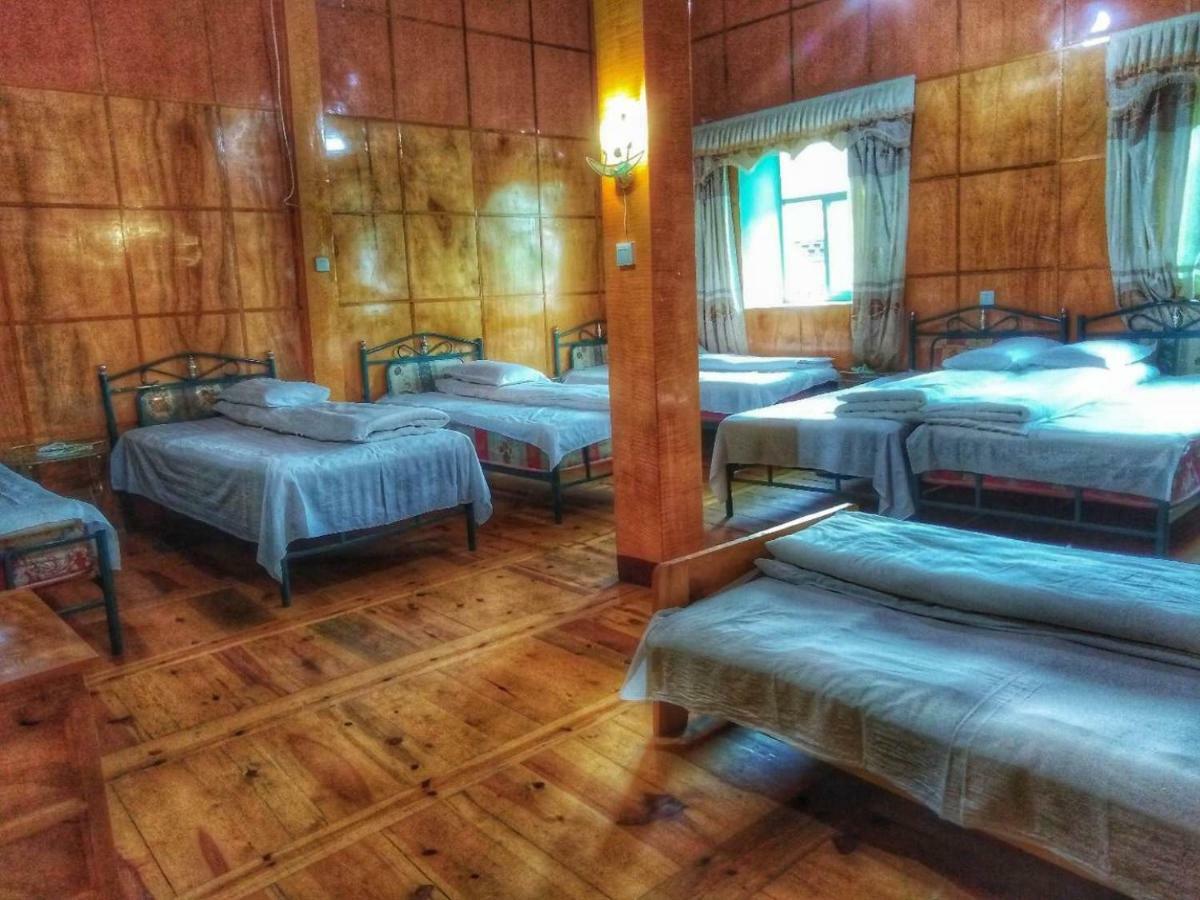 Zishuo Zihua Guest House Daocheng Eksteriør billede