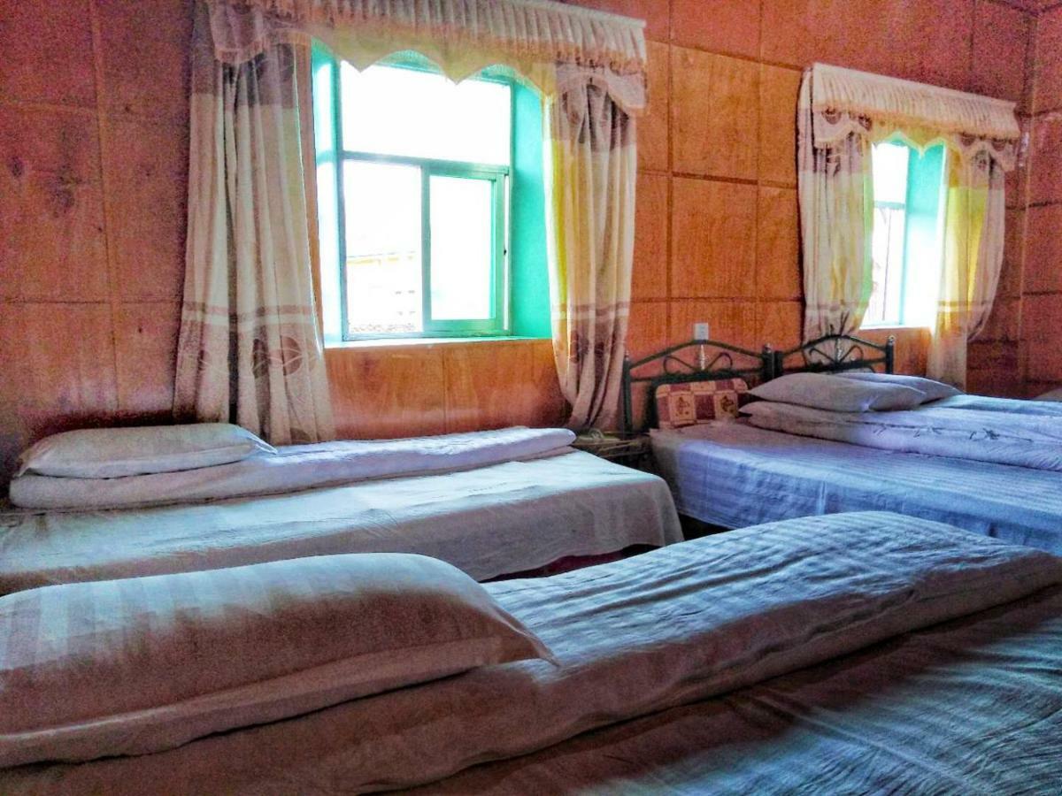 Zishuo Zihua Guest House Daocheng Eksteriør billede