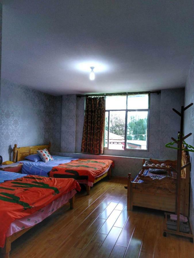 Zishuo Zihua Guest House Daocheng Eksteriør billede